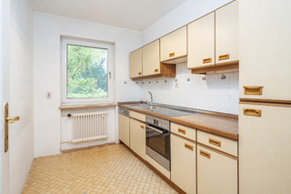 separate kitchen with natural light