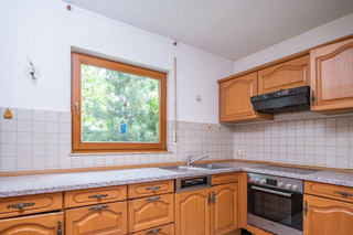 separate kitchen with natural light