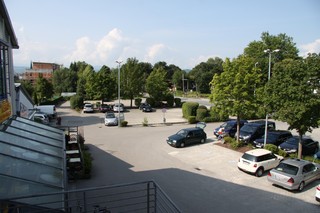 Parking spaces with adjoining new building