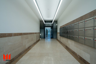 Zone d'entrée avec boîtes aux lettres