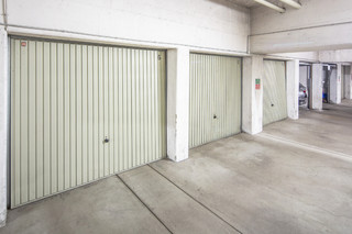 2 lockable single garages in the basement